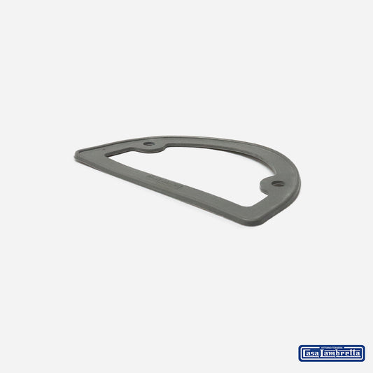 Gray plastic gasket on a white background with Exa Lambretta logo.